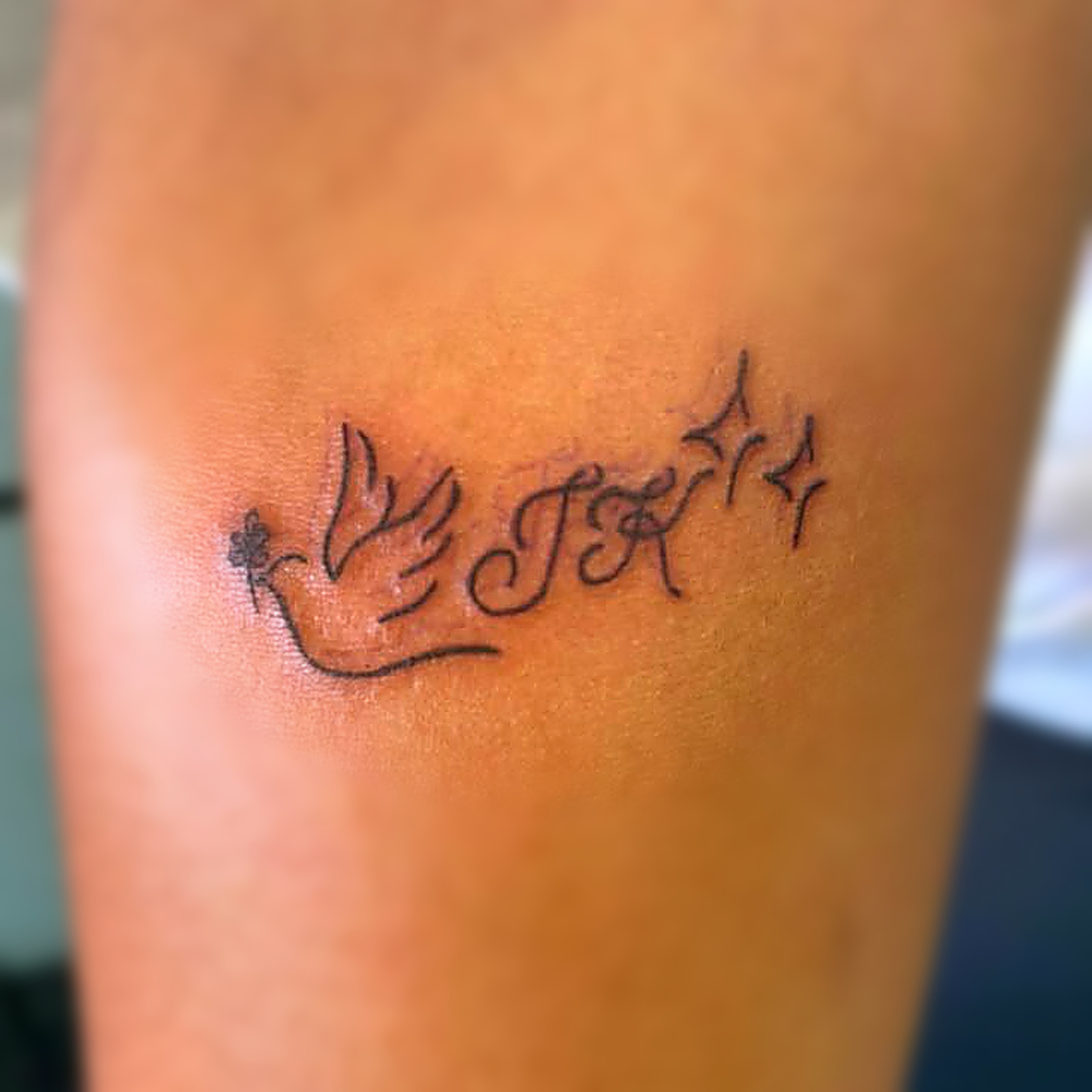 Dove tattoo with initials by Skin Stickers Johannesburg