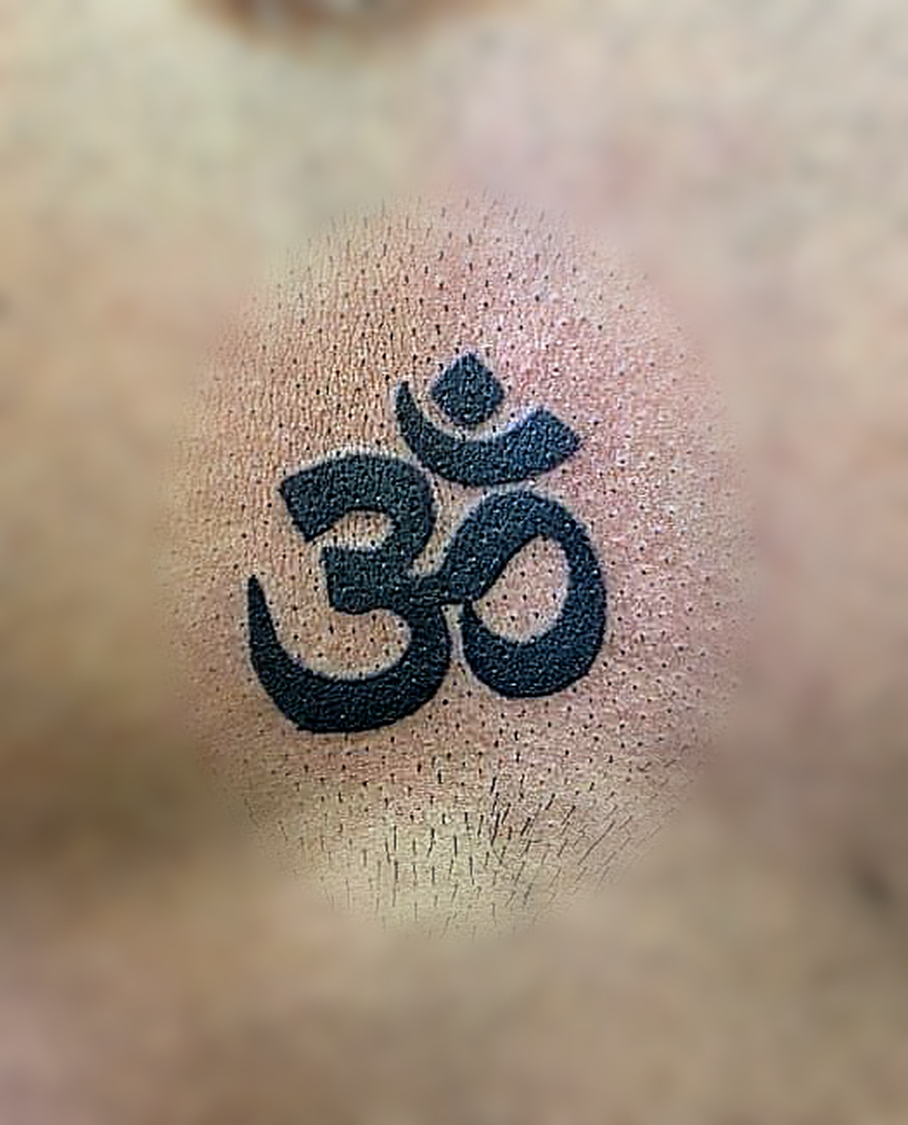 Om symbol tattoo by Skin Stickers Tattoo Studio